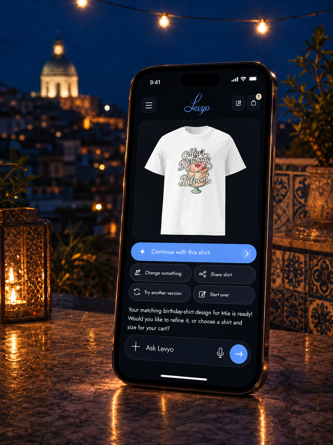 Illustrated phone showing the real Mia’s Birthday Bloom design and the current Maker’s change and shirt-selection controls.