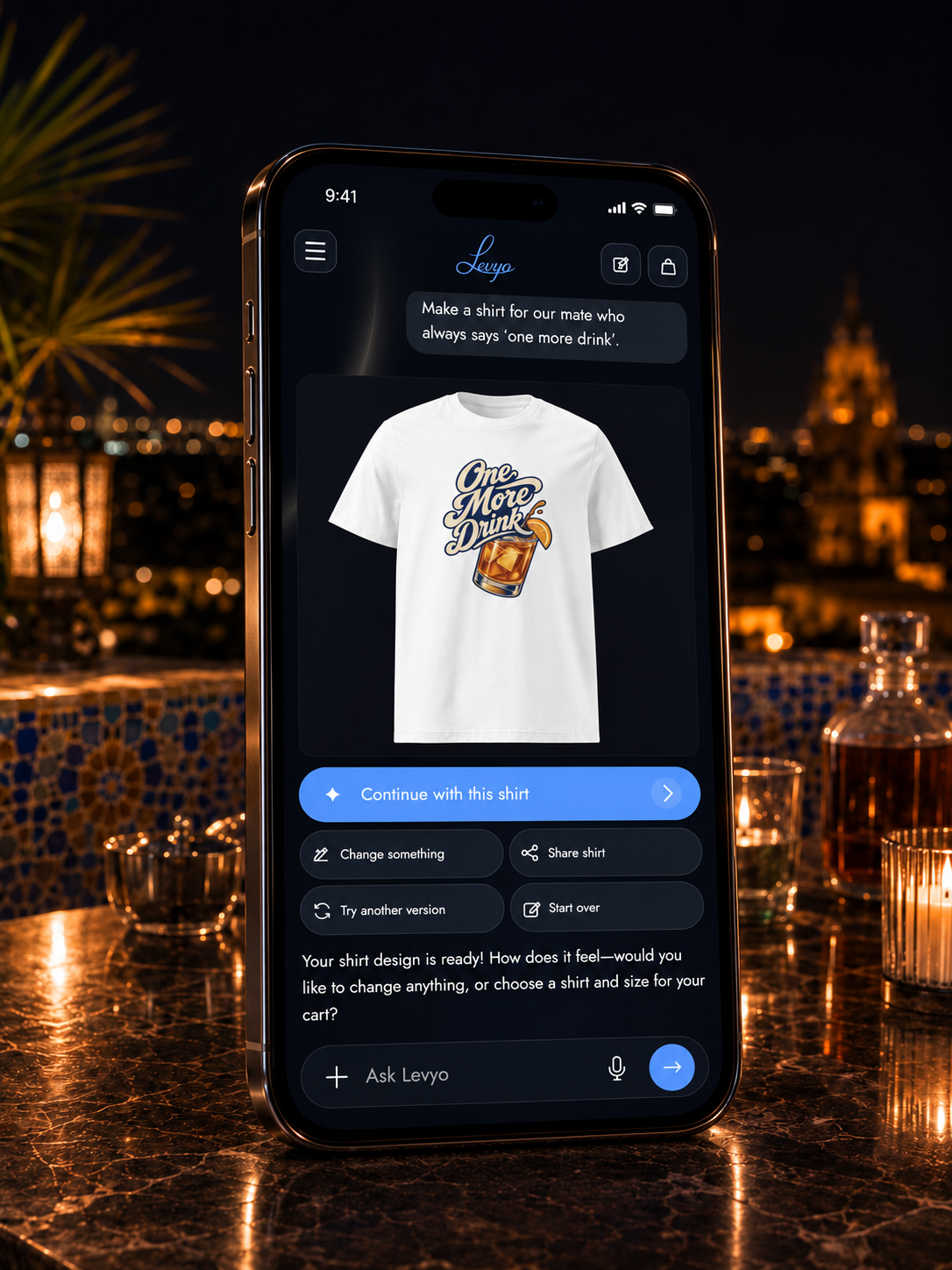 Illustrated iPhone in the same rooftop scene showing the real One More Drink design made in Levyo Maker.